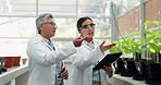 Tablet, plants and team of scientists in a greenhouse for medical pharmaceutical research or study. Agriculture, agro and women researchers with technology for science collaboration in conservatory.