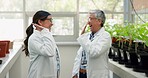 Scientist, high five and teamwork of women in greenhouse of mentor, student and funny celebration. Botany science, hands together and medical doctor excited in success of achievement in farm research