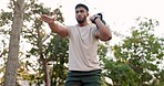 Outdoor fitness, kettlebell squat and man doing resilience workout, active training or body exercise challenge. Sunshine, equipment and person focus on muscle building in nature, park or forest woods