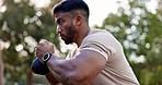 Park fitness, kettlebell squat and strong man, bodybuilder or athlete doing strength workout, active training or exercise. Determined, equipment and profile of Indian person doing muscle building