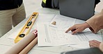 Hands, blueprint and people in architecture meeting for teamwork, planning design or construction. Closeup, table and architects or group in engineering with an illustration for building strategy