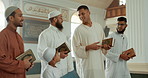 Islam, people and walking with Quran in mosque for religion, learning or Ramadan Friday prayer to God. Muslim family men and friends talk belief or culture, Eid Mubarak or praise with faith in Allah