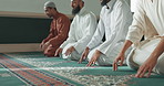 Muslim, praying and men in a Mosque for spiritual religion together as a group to worship Allah in Ramadan. Islamic, Arabic and holy people with peace or respect for gratitude, trust and hope