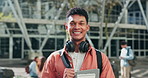 Face, man and student at college with headphones for education, learning and knowledge at campus building. Portrait of cool gen z guy studying at academy, university and smile for scholarship degree 