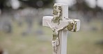 Funeral, tombstone or jesus on cross in graveyard for death ceremony, religion or memorial service. Symbol, background or Christian sign on gravestone for mourning, burial or loss in public cemetery