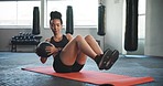 Fitness, gym and woman on floor with ball for core training, exercise and cardio workout on yoga mat. Sports , personal trainer and person with equipment for wellness, healthy body and performance