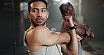 Men at gym together, stretching arms and muscle building strong body, balance and power in fitness. Commitment, motivation and focus, flexible bodybuilder in workout challenge with personal trainer.