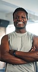 Fitness, happy and face of black man in gym with crossed arms for training, exercise and bodybuilder workout. Sports club, personal trainer and portrait of person for challenge, wellness and health