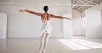 Black woman, ballet and dance performance for spin in training studio. Ballerina, creative art and person twirl in exercise, workout and moving to practice in fitness for wellness of healthy body