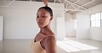 Black woman, ballerina and dancing performance for art in training studio. Ballet, creative and African person exercise, workout and flexible stretching practice in fitness, wellness and healthy body