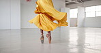 Dancing, feet and a ballet woman for performance in a creative art studio with energy and passion. Legs and shoes of ballerina dancer practice for theater and freedom with balance, textile and talent