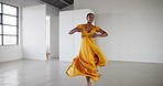 Dancing, performance and a woman for ballet in a creative art studio with energy and passion. African professional dancer practice for theater, ballerina and freedom with balance, textile and talent