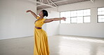 Ballet, woman and dance performance in creative art studio with energy and passion. Professional African dancer practice for theater, ballerina and freedom with balance, dress and talent or wellness