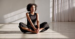 Yoga, meditation and woman breathing, stretching and training body or relax sitting on floor in pose for mindfulness. Zen, dancer and start practice or breathe calm in wellness and healthy exercise