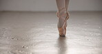 Ballet, shoes and toes in performance, dance or professional moving in studio. Ballerina, woman and pointe legs of creative person in art training, balance or exercise for fitness, health and closeup