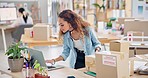 Woman, boxes and laptop for logistics, e commerce and stock management, online shop and stock management. Startup, small business owner or designer with package inventory, computer and website order