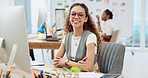 Woman at desk with smile, confidence and office administration, professional consultant in creative job. Receptionist, secretary or happy designer with project management, business pride and computer