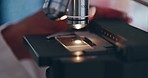 Closeup, science and a microscope for research, healthcare innovation and studying in a lab. Bacteria, analytics and medical or biotechnology gear for education, futuristic test or forensic exam