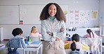 Teacher woman, arms crossed and smile in class with school kids, pride or happy for education career. Academy, classroom and learning expert for children, face or portrait with development for future