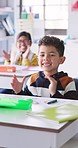 School kids, boy and applause in classroom, happy and excited for learning achievement, goal or studying. Children, celebration and smile on face for education, scholarship and development at academy