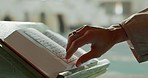 Hands, Quran and closeup of woman in prayer in the mosque for religion study, faith or worship. Gratitude, praise and muslim female person with holy book for spiritual wellness in an islamic temple.
