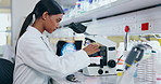 Science, microscope and a student girl in a laboratory for research, innovation or medical breakthrough. Medicine, pharmaceuticals and sample study with a young scientist working in a biology lab