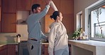 Dance, love or happy couple in kitchen for romance, care or bonding together in an intimate connection. Relax, holding hands or people in celebration of marriage anniversary in the morning at home