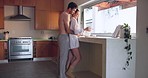 Bake, love or happy couple hug in kitchen for romance, care or bonding together with an intimate connection. Man, woman and romantic people hug in the morning at home cooking breakfast on vacation