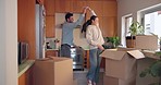 Dance, couple and celebrate moving to new home, real estate investment or freedom of financial security. Happy man, excited woman and hug for energy in celebration of house, property or mortgage loan