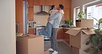 Hug, couple and excited in new home to celebrate real estate investment, freedom or financial security. Happy man, woman and spin in embrace for celebration of moving house, property or mortgage loan