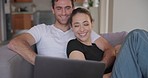 Couple, laptop and laugh on sofa in home to watch movies, streaming multimedia and comedy show online. Happy man, woman and relax in living room at computer, funny video or entertainment subscription