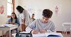 High school, classroom students and boy notebook writing, learning education and copy knowledge, journal or notes. Academy pupil, elementary class and scholarship person doing test, exam or studying