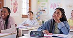 Education, study and student friends laughing in class while learning during an academic lesson together. School, smile and happy with kids in a classroom for scholarship, growth or child development