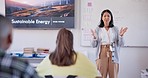 Education, students and teacher doing presentation in classroom for science lesson at school. Professional, learning and woman educator or tutor from Mexico teaching a sustainable energy lecture.