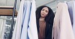 Fashion, shopping and search with woman in store for boutique, sale and retail. Product, clothes and choice with customer and clothing rack option in mall for decision, shirt and inspiration
