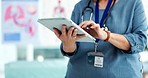 Tablet, hands and closeup of doctor in the hospital doing research for diagnosis or treatment. Digital technology, healthcare and medical worker doing an online consultation for telehealth in clinic.