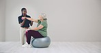 Physiotherapy, exercise ball and old woman patient, chiropractor and weightlifting with dumbbells in consultation. Help, support and elderly care, rehabilitation and health with people at clinic