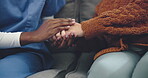 Nurse, woman and holding hands on sofa for support, helping and healthcare or homecare service. Caregiver, doctor and medical people with patient on couch for empathy, kindness and hands together