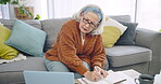 Old woman, writing in notebook and laptop with life insurance and retirement policy paperwork. Manage finance, pension and taxes online with notes and banking at home with asset management documents