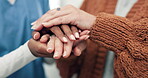 Caregiver, holding hands and comfort cancer patient, sick and disease in hospital. Nurse, support and help person, empathy and kindness in trust, healthcare and hope for medical healing in closeup