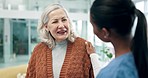 Smile, support or assisted living with a senior and caregiver in a living room for conversation together during a visit. Happy, care and empathy with an old woman and young nurse in a retirement home