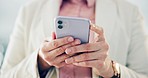 Phone, hands and closeup of businesswoman typing a text message on social media or mobile app. Technology, research and female lawyer scroll on internet, online or website with cellphone in workplace