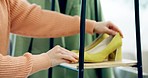 Heels, clothes choice and hands in mall, shop or retail store market of customer. Shopping, clothing decision and closeup of woman at boutique rack to check sale discount of shoes at fashion wardrobe