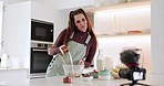 Kitchen video camera, milk or woman cooking, influencer live streaming or teaching nutrition food, home recipe or baking. Online production, tutorial or chef filming media vlog, pour liquid or record
