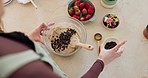 Cooking, chocolate chip and pancakes with hands of person in kitchen for health, morning routine and nutrition. Fruit, wellness and food with closeup of breakfast batter at home for brunch and diet