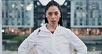 Fitness, breathing and face of woman in the city running for race, marathon or competition training. Serious, sweat and portrait of female athlete runner doing a cardio workout or exercise in town.