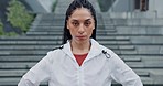 Sports, serious and face of woman in the city running for race, marathon or competition training. Fitness, sweat and portrait of female athlete runner doing a cardio workout or exercise in town.