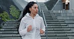 Woman, fitness and running on stairs in city for workout, cardio exercise or outdoor training. Active female person, athlete or runner in sports motivation, sprint or lose weight in an urban town