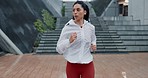 Woman, fitness and running in city for workout, cardio exercise or outdoor training by stairs. Active female person, athlete or runner in sports motivation, sprint or lose weight in an urban town