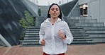 Woman, fitness and running in city for exercise, cardio workout or outdoor training by stairs. Portrait of female person, athlete or runner in sport motivation, sprint or lose weight in an urban town